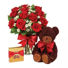 What else need be said? This is it, the definitive floral masterpiece, the perfect gift...boasting gorgeous roses in red, yellow, pink and bi-color with a pretty red satin ribbon in a rose vase.