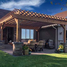 Add a touch of elegance to your outdoor living space with an attractive, one-of-a-kind pergola with JK Landscape.