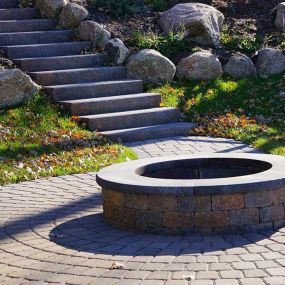 When the sun goes down, there’s nothing like a beautifully designed fire pit to add ambience and comfort to your outdoor living space. Whether you’d like a central focal point or smaller accent piece, we’ll design and install the perfect fire feature for your property