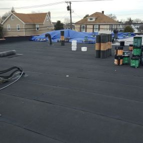 Unseen and often overlooked, flat roofs require routine maintenance and detailed repair to effectively prevent water infiltration.
