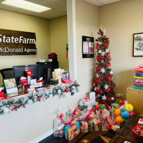 Ryan McDonald State Farm insurance agent and team collected presents for local teachers, Brock, TX