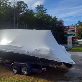 Boat shrink wrapping at Wheels and Deals in Windham, Maine.
