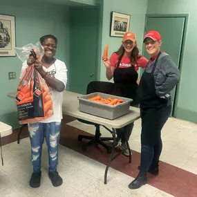 John Acker State Farm team volunteering at Our Lady of Mercy Community Outreach's Soup Kitchen!