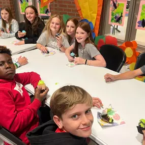 Celebrating the joys of springtime with our future leaders! These young minds are enjoying a delightful treat during our celebration at the local school. It’s moments like these that remind us of the importance of community and togetherness.