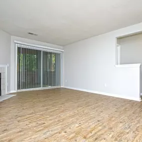 Living Room with fireplace and balcony