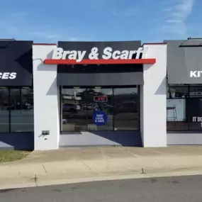 Outside view of the Bray & Scarff appliance store building with white walls in Alexandria, VA