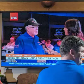 It was a great way to remember Pearl Harbor Day by working the Rocky Mountain Honor Flight telethon. That's me in the Santa Hat behind one of our great veterans, Danny Tomlinson, who is giving an interview.