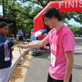 Flash Pride Rabbit Run 5k Karen sponsored in April.
 
Flash Pride is a boys running group at Pineville Elementary.  The 5k is used to raise money for the boys’ entry fees into local races and to help support the group.