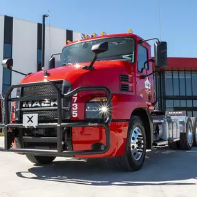 Red Mack Truck At Housby