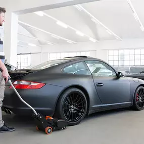 Moviroll electric reel and car pusher