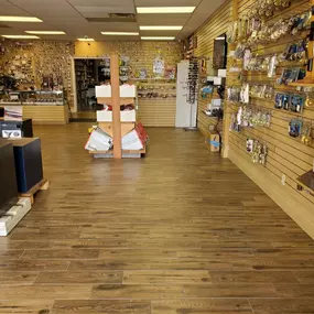 Interior of Michael's Keys Locksmith in Colleyville, TX displaying a variety of standard, vanity, and high-security keys, organized on wall racks.