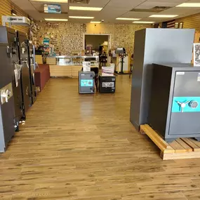 Interior of a Michael’s Keys Locksmith store with a selection of Home and Commercial safes