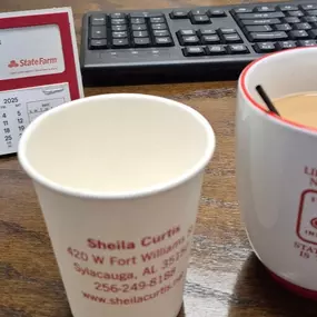 Just another day at the office, fueled by coffee and coverage. Stop by Curtis Insurance Agency for a quote and a warm welcome—Sheila and the team are here to help!