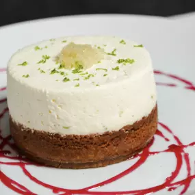 End on a sweet note with the Triple Layer Key Lime Pie—fresh key lime, almond graham cracker crust, topped with whipped cream and lime 