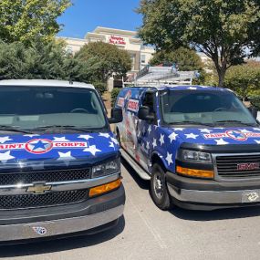 PAINT CORPS Vans on Job Site