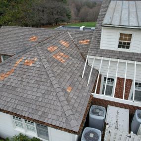 a shingle roof that has been repaired by Class Roofing