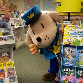 Peek-a-boo! Dog Man has arrived! This morning, we gave him a tour of the store, and he's excited to meet everyone! Are you ready to Power Up with Dog Man? We're celebrating the release of Dog Man: The Scarlet Shedder, so join us from 2-4pm today at our meet and greet with Dog Man!