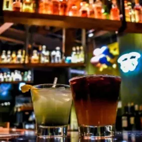 Craft cocktails served with a side of style. At The Corner in Ferndale, every pour sets the mood—where good drinks, bold flavors, and better company come together under glowing shelves and retro vibes. Cheers to nights worth remembering.