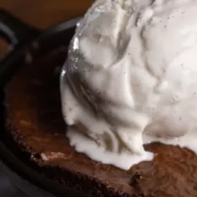 Dive into warm, gooey indulgence with our signature Petit Gateau at The Corner—served sizzling in a cast iron skillet and topped with creamy vanilla ice cream. It’s rich, melty, and made to be devoured.