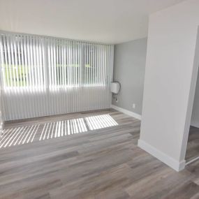 Spacious living room with large windows