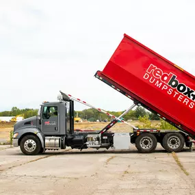 standard dumpster being delivered