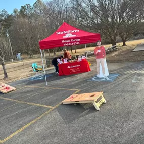 Stop by our booth today to play some corn hole and get a free quote!