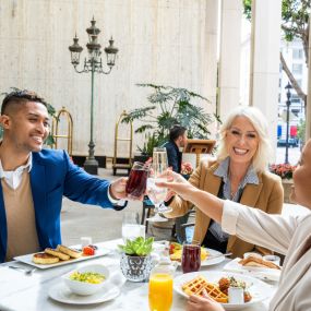 Friends enjoying brunch at the Westgate Room.