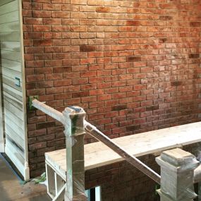 Elevate your space with timeless elegance through our impeccable brick wall services. Whether you seek to add a touch of warmth to your interior or create a striking exterior facade.