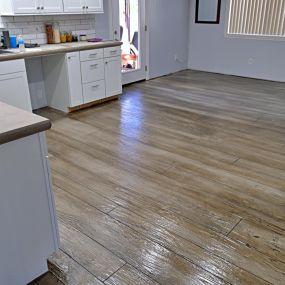 We pride ourselves on being able to provide stunning alternatives to concrete work and wood floors. Our decorative and woodlook floors are fully customizable, easy to clean, super durable, scratch resistant, & waterproof.