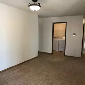 Carpeted Living Space at Royal Oaks Apartments, North Dakota, 58103