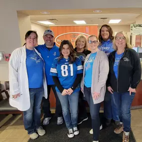 Michigan Eye Institute Employees Wearing Detroit Lions Attire