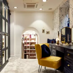 Midnight Blue Fitted Mirrored Wardrobes in Hampton with a coordinating dressing table.