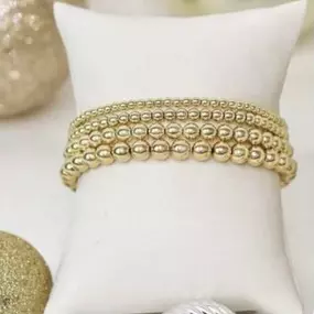 Gold plated beaded bracelets are so trendy right now and look beautiful stacked with other bracelets!