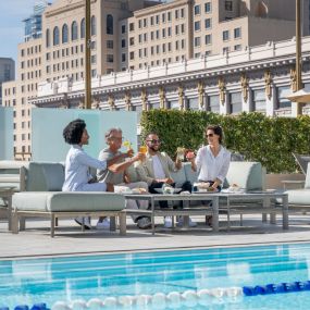 Friends enjoying the roof top pool at Westgate Hotel in Downtown San Diego.