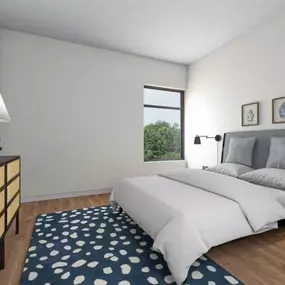 a bedroom with a bed and a dresser and a window