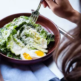 Little Gem Caesar with a 6-minute egg