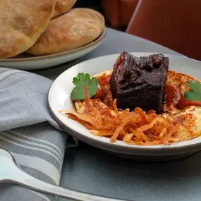 SPICY SHORT RIB HUMMUS | harissa, pulled short rib, crispy shallot