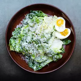 Little Gem Caesar with a 6-minute egg