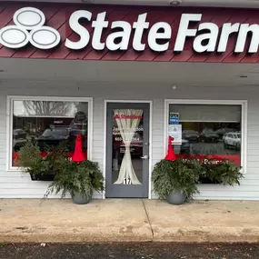 Jason Hodgdon - State Farm Insurance Agent office front with holiday gnome bushes!