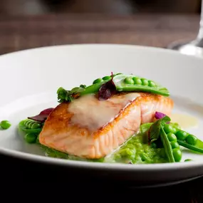 Scottish salmon on a bed of English pea risotto