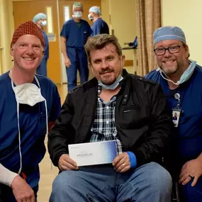 Specialty Eye Institute Doctors with Patient