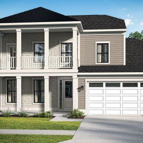Two story tan home with two care garage in the DRB Homes Barbados home plan in the DRB Homes Chase Oaks Community