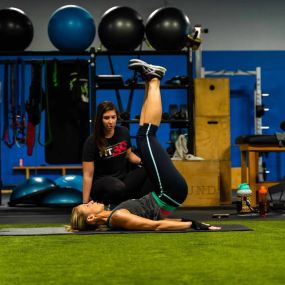personal Trainer works with athletes at Freedom Fitness customizes Personal training sessions