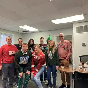 Ugly Christmas sweater day at Steve Paige State Farm insurance agent's office Sandy Springs