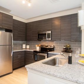 Model kitchen at Fifth Street Place Apartments