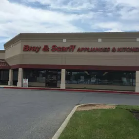 Outside view of the Bray & Scarff appliance store building in Columbia, MD with red lettering