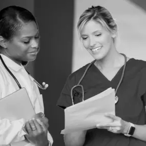 Nurse speaking with a doctor