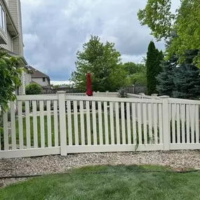 white vinyl fence