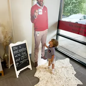 Had the cutest little visitor at the office today that wanted to hang out with Jake ❤️ #BestForYourBUCK #Jake #JakeFromStateFarm #likeagoodneighbor #BabyLou