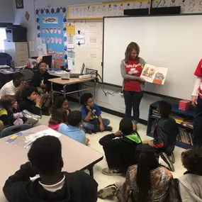 Team member Jessica reading to the children at Brentwood for Dr Seuss Day!